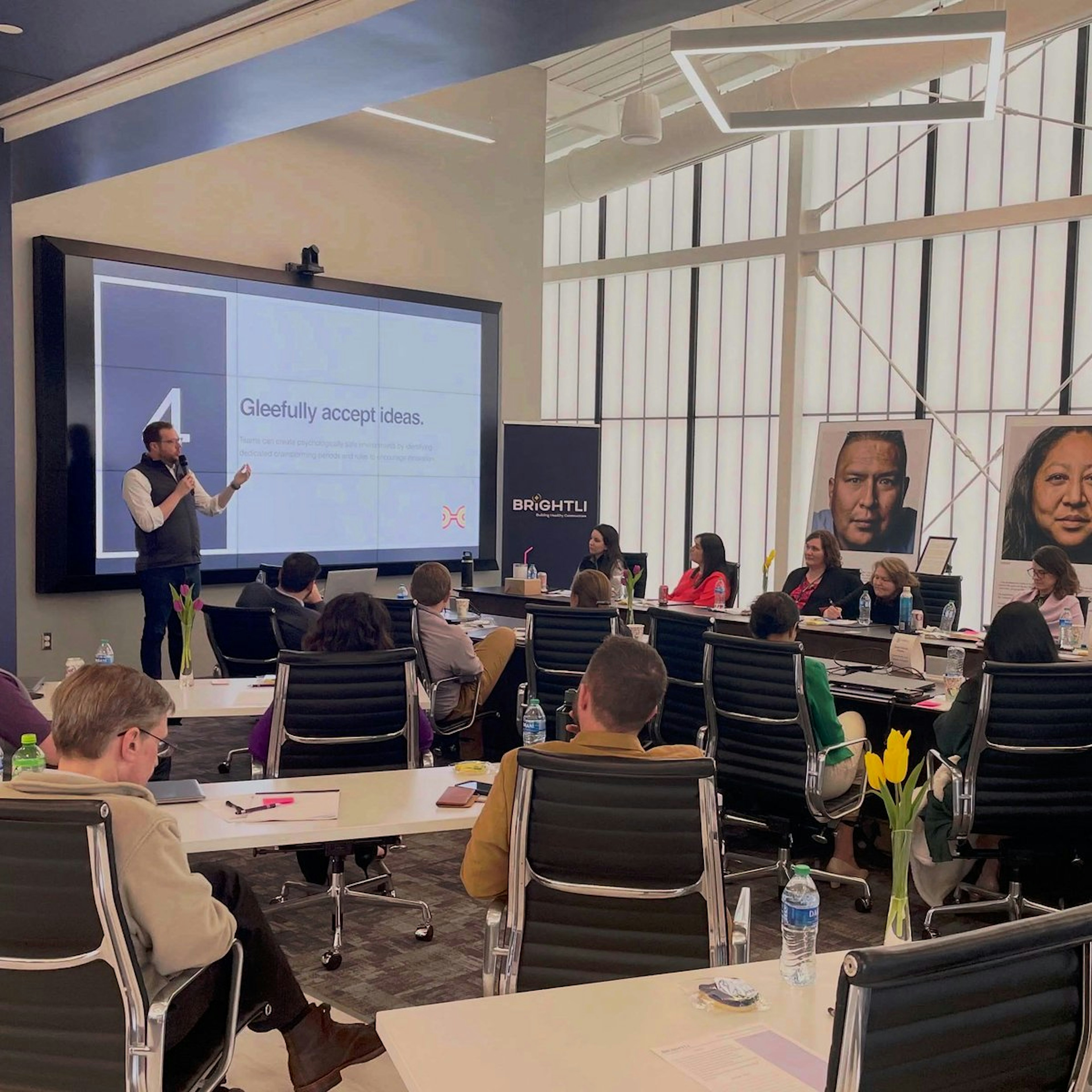 Close-up of a Habitat consultant taking notes in a workshop.