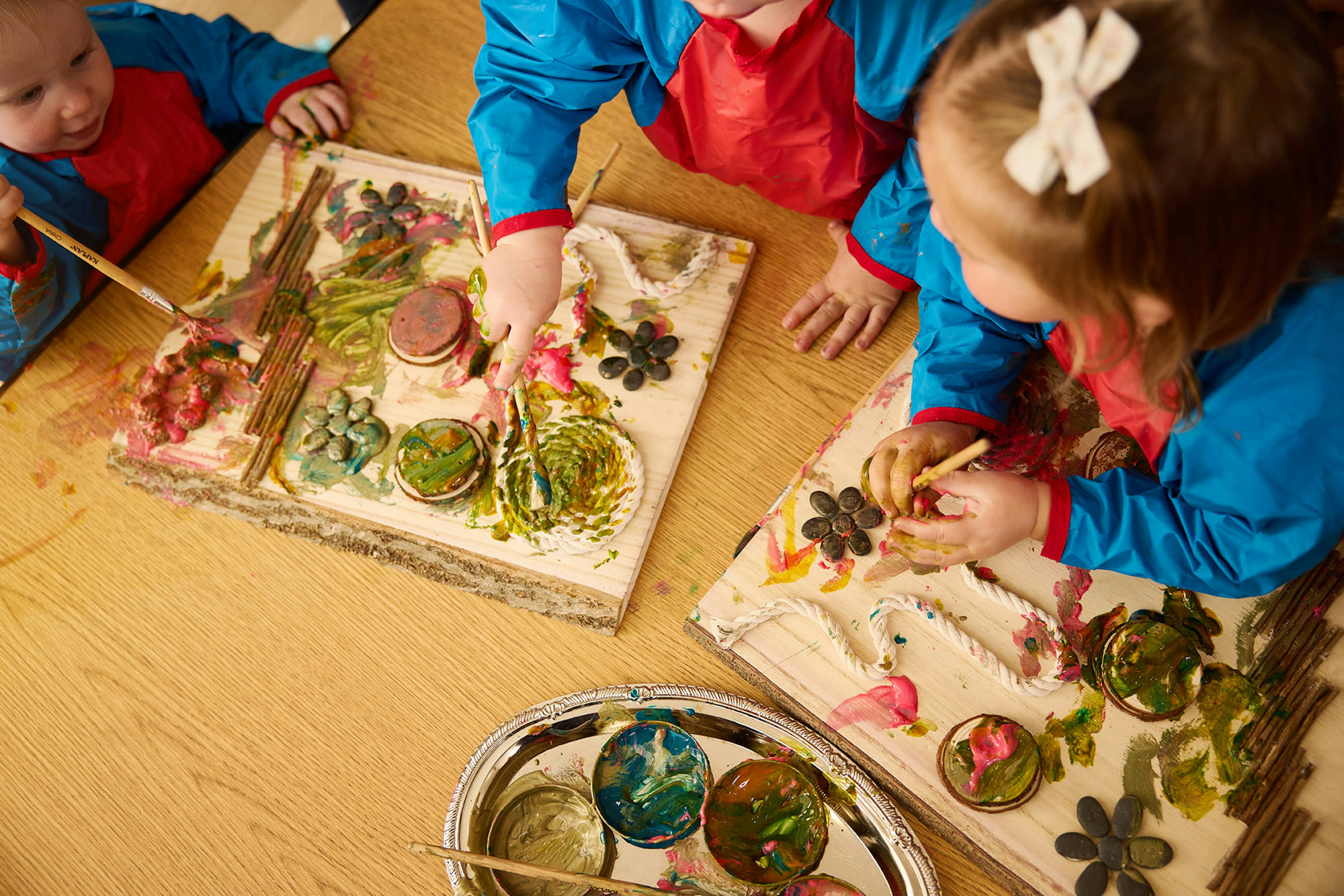 Collage of Little Sunshine's Playhouse website modules including program highlights, testimonials, contact forms, and Find a School banners.