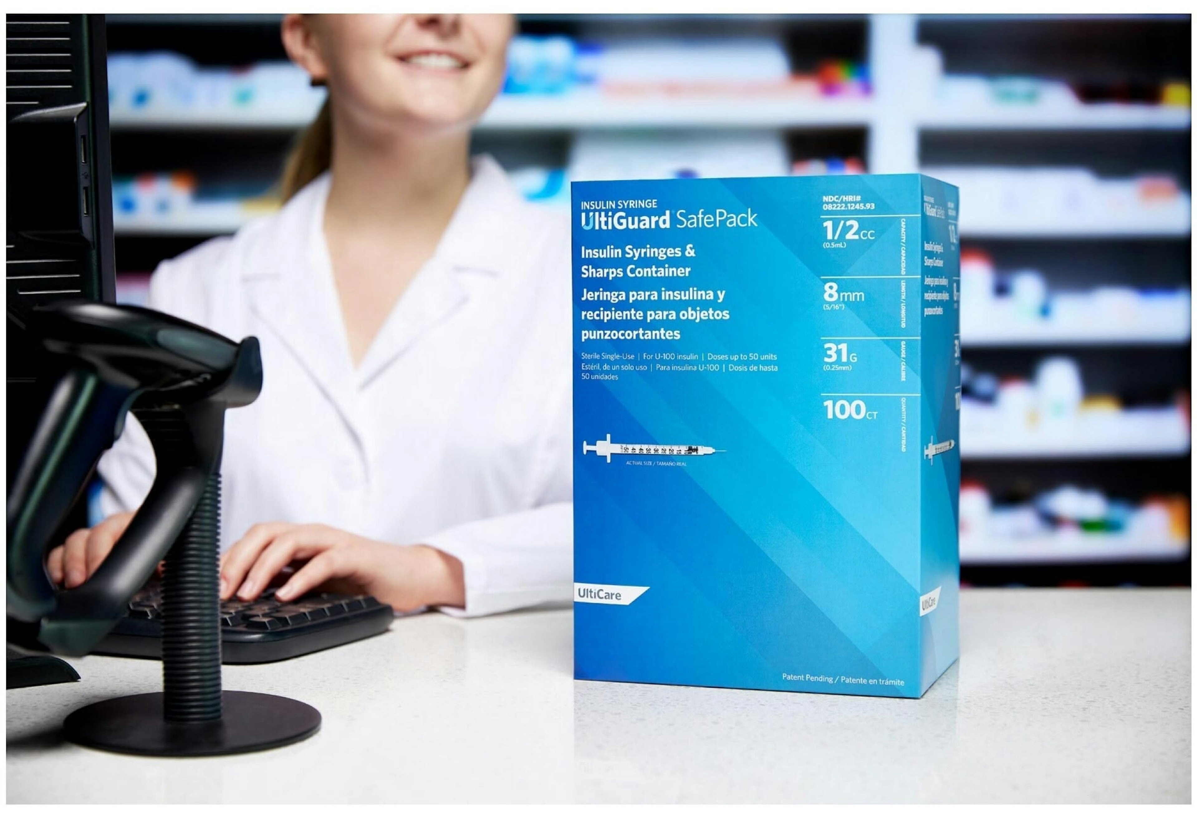 UltiGuard Safe Pack packaging displayed on a pharmacy counter in front of a pharmacist at work.
